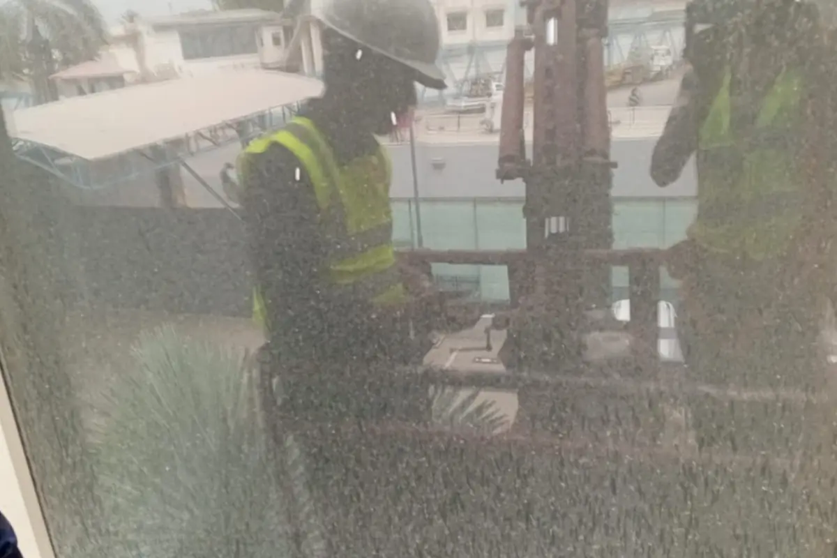 Building glass facade before exterior cleaning at height