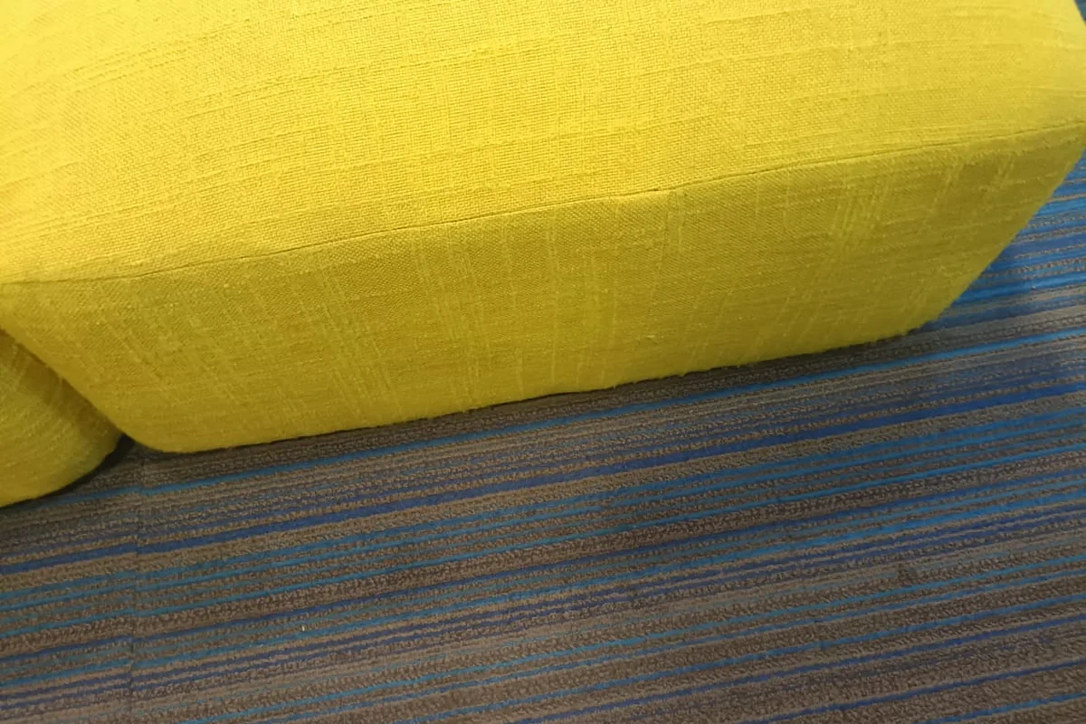 The same sofa seat after upholstery deep cleaning, soiling removed